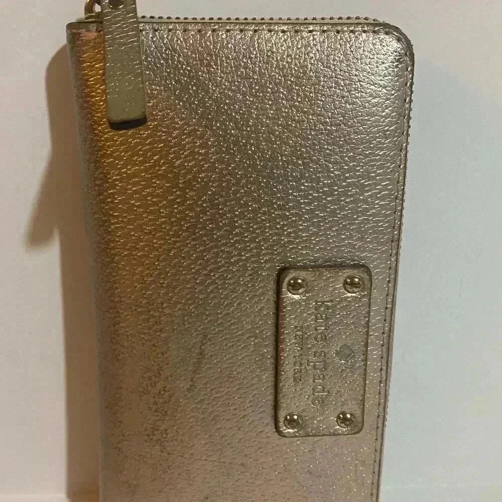 Kate spade metallic bronze leather wallet